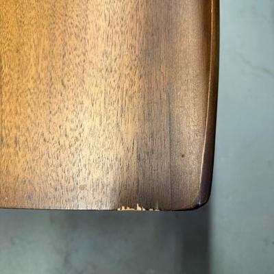 Pair Of Bassett Artisan Collection MCM Walnut Surfboard End Tables with a Spindled Lower Shelf