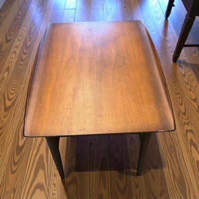 Pair Of Bassett Artisan Collection MCM Walnut Surfboard End Tables with a Spindled Lower Shelf