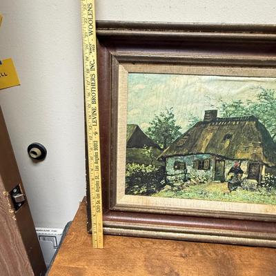 Sale Photo Thumbnail #115: Framed reproduction print of Vincent van Gogh's painting Farmhouse in Nuenen, also known as Cottage and Woman with Goat.   Print is in fair to good condition, some water damage that may be able to be cleaned. Minor damage to the frame (see photos). Measur