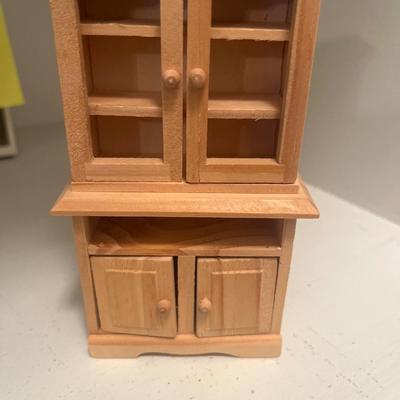 Wooden doll cabinet