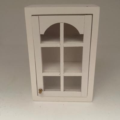 Wooden dollhouse cabinet