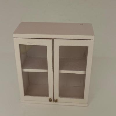 Wooden doll house cabinet