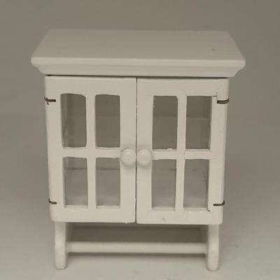 Wooden dollhouse cabinet