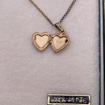 1/20 12kt small locket in original box