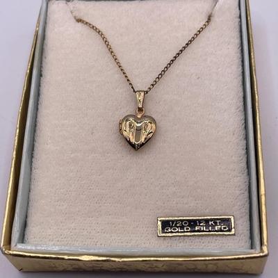 1/20 12kt small locket in original box