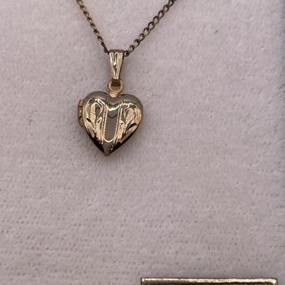 1/20 12kt small locket in original box
