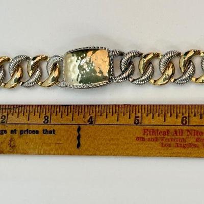 Sale Photo Thumbnail #178: In good used condition. Similar to a Brighton two-tone weave chain ID bracelet.