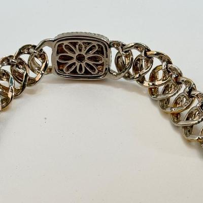 Sale Photo Thumbnail #180: In good used condition. Similar to a Brighton two-tone weave chain ID bracelet.