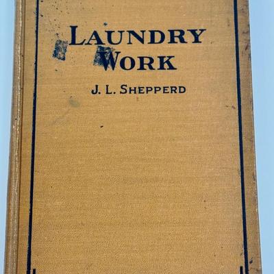 Sale Photo Thumbnail #275: Good condition for its age. Hardcover book addressing laundry work and domestic science, written by a professor at the University of Minnesota and designed for use as a textbook.