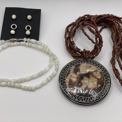 Milk glass and brown Jasper with unique pendant