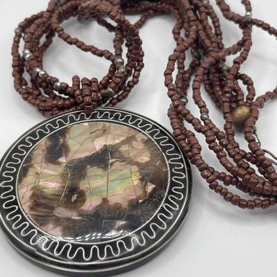 Milk glass and brown Jasper with unique pendant