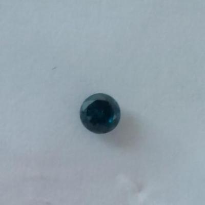 0.045 carat irradiated blue-green diamond