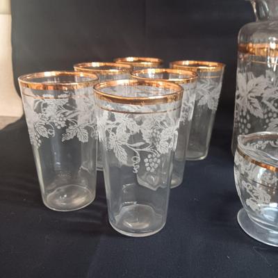 BARTLETT COLLINS 12 GLASS TUMBLERS, PITCHER AND CRREAM/SUGAR SET WITH ETCHED GRAPEVINE PATTERN AND GOLD TRIM