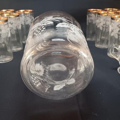 BARTLETT COLLINS 12 GLASS TUMBLERS, PITCHER AND CRREAM/SUGAR SET WITH ETCHED GRAPEVINE PATTERN AND GOLD TRIM