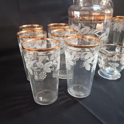 BARTLETT COLLINS 12 GLASS TUMBLERS, PITCHER AND CRREAM/SUGAR SET WITH ETCHED GRAPEVINE PATTERN AND GOLD TRIM