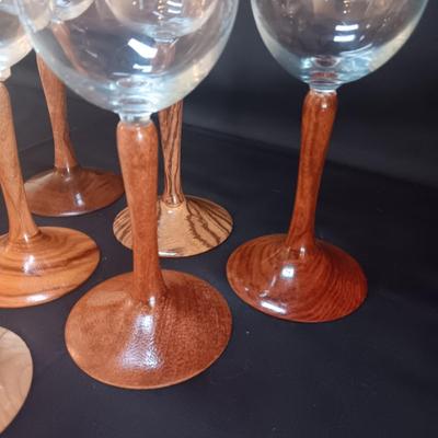 9" WINE GLASSES, EACH WITH DIFFERENT TYPE OF WOODEN STEMS, HANDMADE BY JERRY ERTLE OF FT COLLINS, CO
