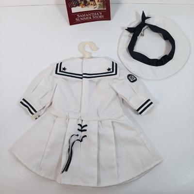 LOT 27: American Girl Molly's School Story Dress and Samantha's Summer Story Dress with Dollie & Me Dress