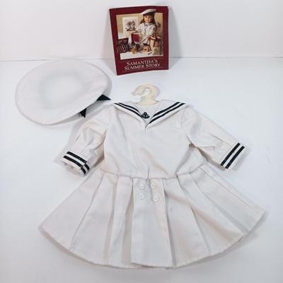 LOT 27: American Girl Molly's School Story Dress and Samantha's Summer Story Dress with Dollie & Me Dress
