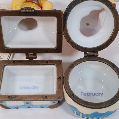 LOT 28: Disney Winnie-the-Pooh Calendar Series (12) Trinket Boxes with Display Stand