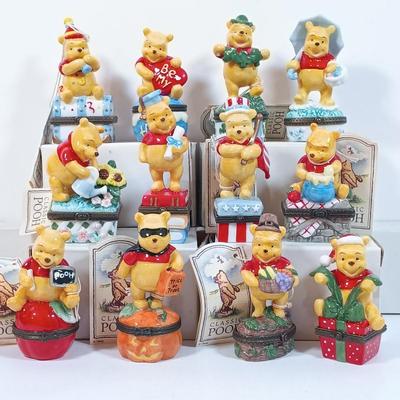 LOT 28: Disney Winnie-the-Pooh Calendar Series (12) Trinket Boxes with Display Stand
