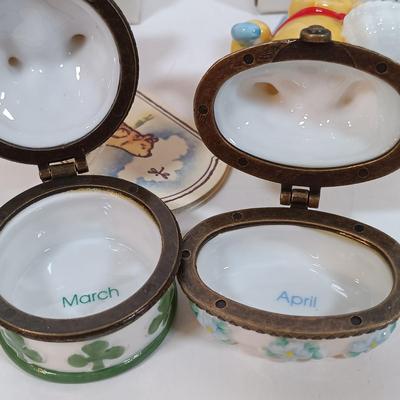 LOT 28: Disney Winnie-the-Pooh Calendar Series (12) Trinket Boxes with Display Stand