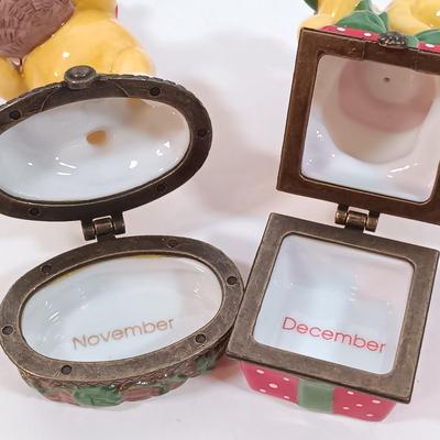 LOT 28: Disney Winnie-the-Pooh Calendar Series (12) Trinket Boxes with Display Stand