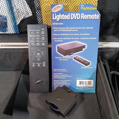 LOT 30: PlayStation 2 Console with Case and Accessories