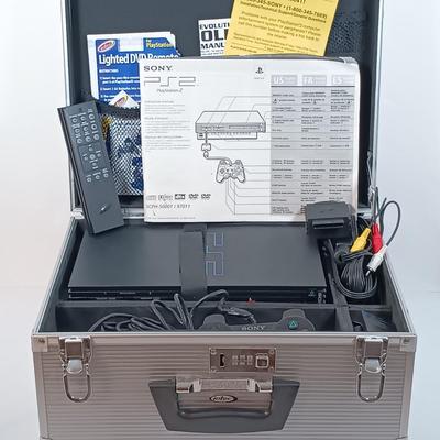 LOT 30: PlayStation 2 Console with Case and Accessories