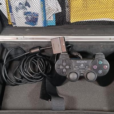 LOT 30: PlayStation 2 Console with Case and Accessories