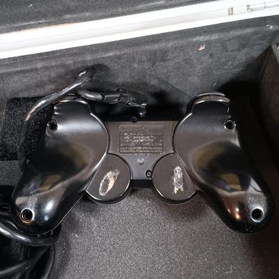 LOT 30: PlayStation 2 Console with Case and Accessories