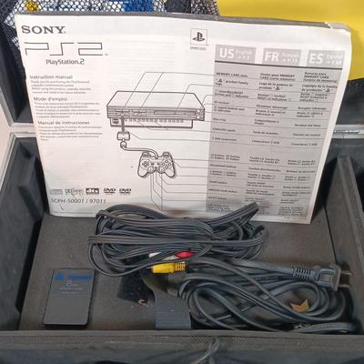 LOT 30: PlayStation 2 Console with Case and Accessories