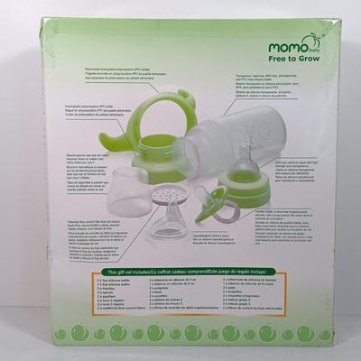 LOT 38: NIB Set of (2) Momo Baby Silcone Bottle Gift Sets