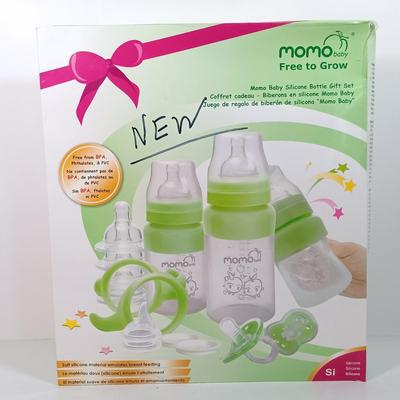 LOT 38: NIB Set of (2) Momo Baby Silcone Bottle Gift Sets