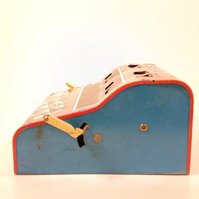 LOT 39: Vintage Wolverine Arithmetic Quiz Tin Toy