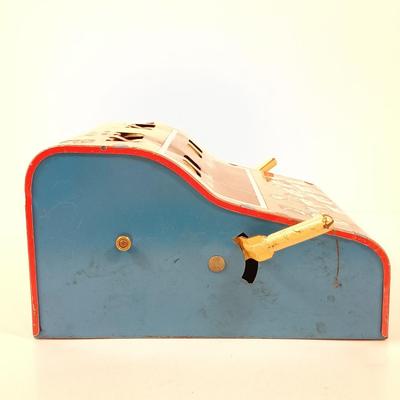 LOT 39: Vintage Wolverine Arithmetic Quiz Tin Toy