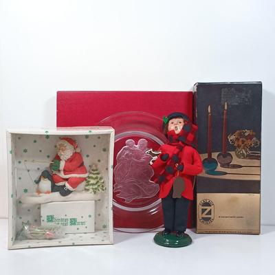 LOT 43: Byers Choice Child with Cookies, Danbury Mint Holy Family Crystal Plate, Zwiesel Germany Clear Candlestick Vases & Santa...