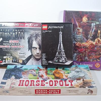 LOT 46: Lego Architecture Eiffel Tower, Criss Angel Mind Freak Platinum Magic Kit, Horse-Opoly & 550 Pc The Alchemist Puzzle
