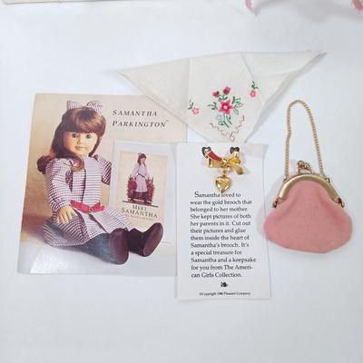 LOT 48: American Girls Samantha's Christmas Story Dress, Stockings & Ribbon with Samantha's Velvet Hat, Gold Brooch, Purse...