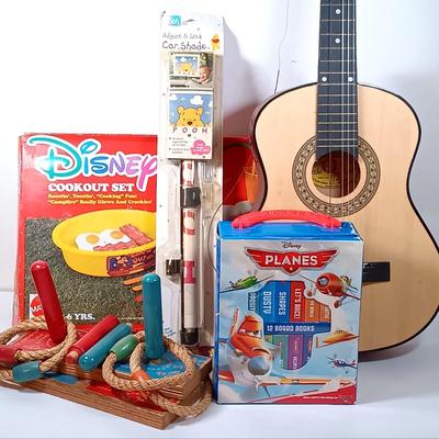LOT 51: George Washburn Lyon LLAG1 Little Lion Children's Guitar, Camp Mickey Cookout Set, Planes Board Books & More