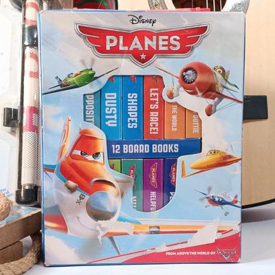 LOT 51: George Washburn Lyon LLAG1 Little Lion Children's Guitar, Camp Mickey Cookout Set, Planes Board Books & More