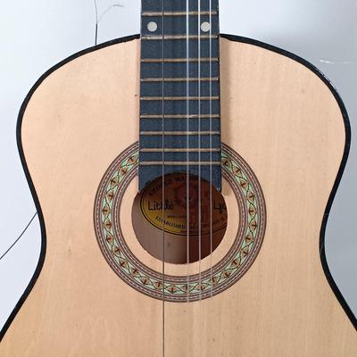 LOT 51: George Washburn Lyon LLAG1 Little Lion Children's Guitar, Camp Mickey Cookout Set, Planes Board Books & More