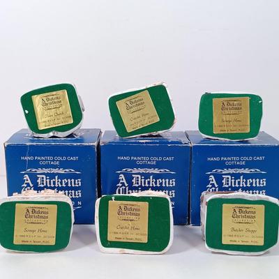 LOT 52: Vintage Munson Masterpiece Christmas Greeting Cards, Hallmark Mickey's Merry Carousel Ornament, A Dickens Christmas Cottages...