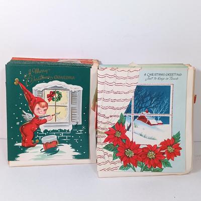 LOT 52: Vintage Munson Masterpiece Christmas Greeting Cards, Hallmark Mickey's Merry Carousel Ornament, A Dickens Christmas Cottages...