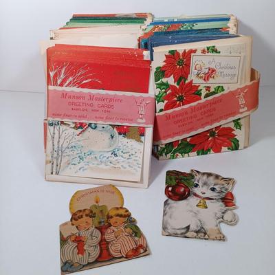 LOT 52: Vintage Munson Masterpiece Christmas Greeting Cards, Hallmark Mickey's Merry Carousel Ornament, A Dickens Christmas Cottages...