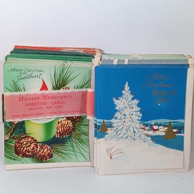 LOT 52: Vintage Munson Masterpiece Christmas Greeting Cards, Hallmark Mickey's Merry Carousel Ornament, A Dickens Christmas Cottages...