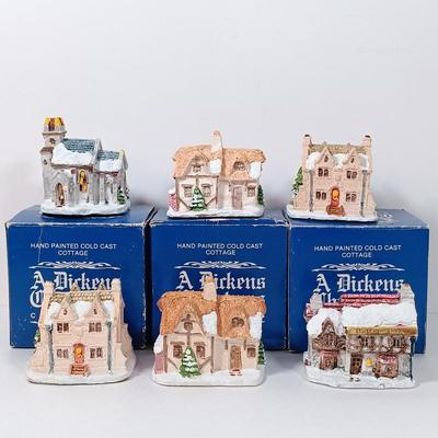 LOT 52: Vintage Munson Masterpiece Christmas Greeting Cards, Hallmark Mickey's Merry Carousel Ornament, A Dickens Christmas Cottages...