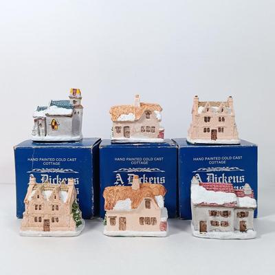 LOT 52: Vintage Munson Masterpiece Christmas Greeting Cards, Hallmark Mickey's Merry Carousel Ornament, A Dickens Christmas Cottages...