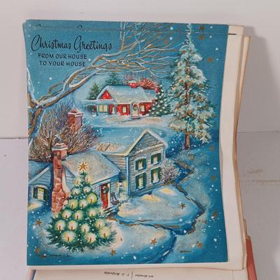 LOT 52: Vintage Munson Masterpiece Christmas Greeting Cards, Hallmark Mickey's Merry Carousel Ornament, A Dickens Christmas Cottages...