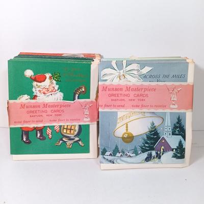 LOT 52: Vintage Munson Masterpiece Christmas Greeting Cards, Hallmark Mickey's Merry Carousel Ornament, A Dickens Christmas Cottages...