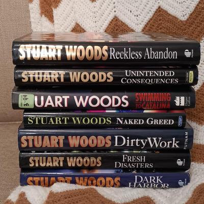 LOT 54: Collection of Stuart Wood and Sharon Kay Penman Hardback Novels with a Large Crocheted Throw Blanket